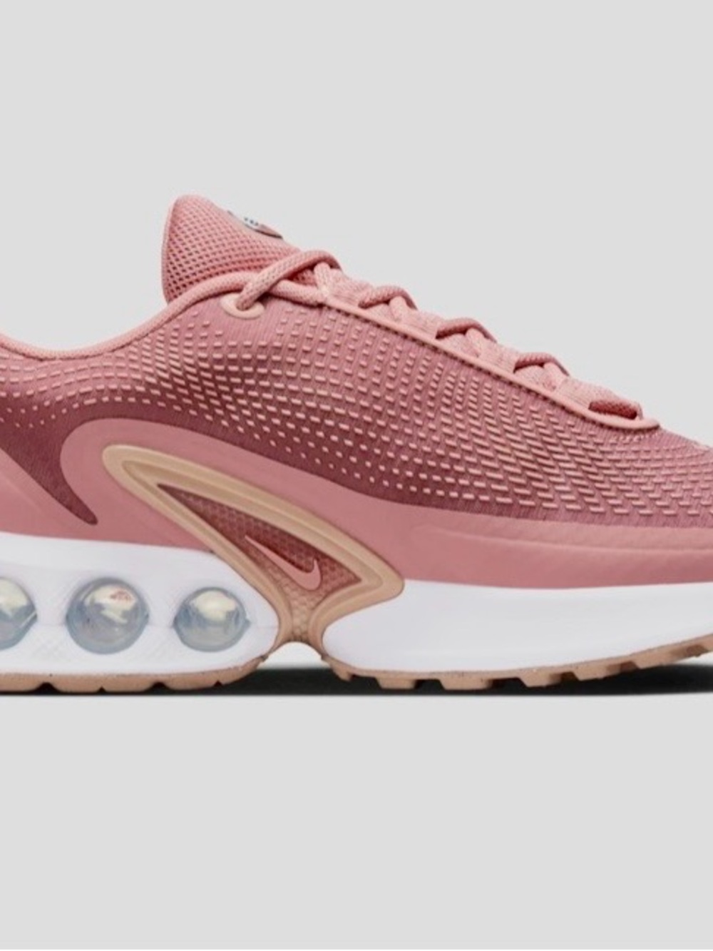 Nike Pink Women's Running Sneakers with Rose-Gold Accents
